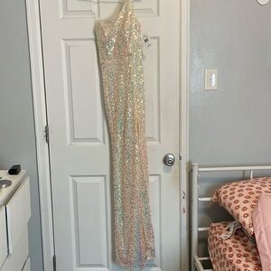 Brand new Crystal Doll size 1 light yellow sequined prom/homecoming dress.